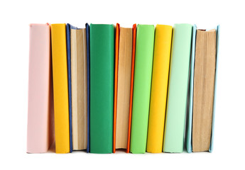 Stack of colorful books isolated on white