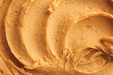 Tasty peanut butter as background © Pixel-Shot