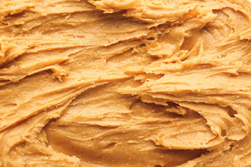 Tasty peanut butter as background