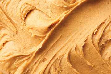 Tasty peanut butter as background