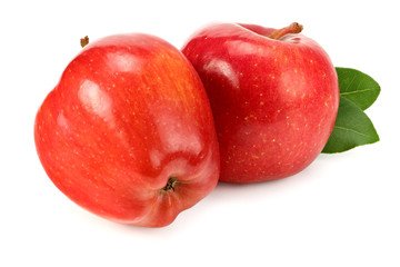two red apples with green leaves isolated on white background