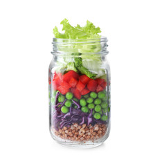 Healthy salad in glass jar isolated on white