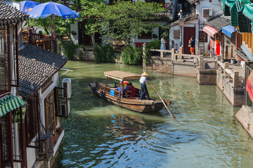 Fototapeta na wymiar Shanghai, China - May 23, 2018: Boat cruise on the canal in Zhujiajiao water town