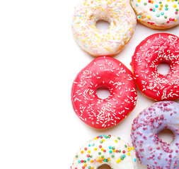 Sweet tasty donuts on white background