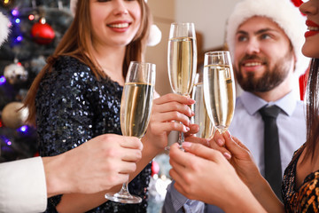 Friends drinking champagne at New Year party