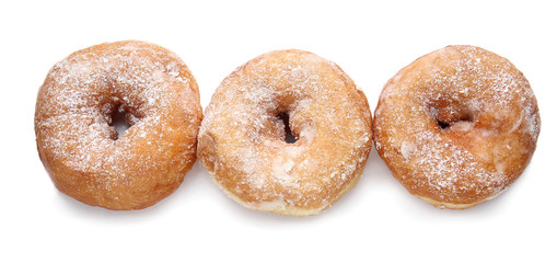 Sweet tasty donuts on white background