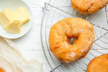 Sweet tasty donuts on table
