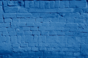 brick wall texture toned in trendy Classic Blue color of the Year 2020