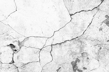 Texture of a concrete wall with cracks and scratches which can be used as a background - obrazy, fototapety, plakaty
