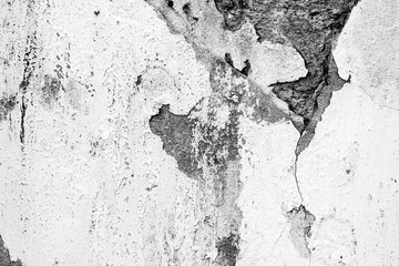 Texture of a concrete wall with cracks and scratches which can be used as a background