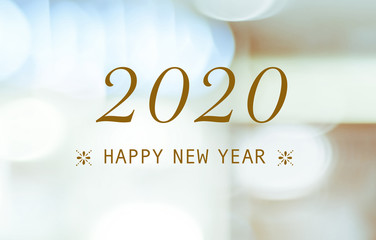 Happy New Year 2020 on blur abstract bokeh background, new year greeting card, banner