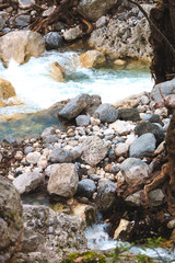 Large pebbles at the bottom of the river.
