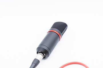 Sound studio. Microphone with cable isolated on white background