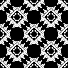 Fototapeta premium Black and white design. Ethnic boho seamless pattern. Lace. Embroidery on fabric. Patchwork texture. Weaving. Traditional ornament. Tribal pattern. Folk motif. Vector illustration for web design or pr