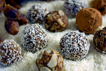 Raw Food Candy Balls. Handmade vegan sweets made of almonds, walnuts, dates, coconut and cocoa. Raw...