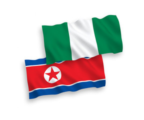 Flags of North Korea and Nigeria on a white background