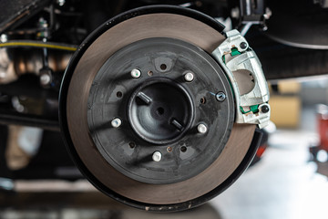 Close up view of assembled disk brakes with brake caliper