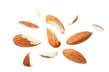 Fotobehang almonds baked pieces snack  and cracks Spread out  on white isolated .Clipping path - © SizeSquare's