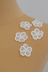 Texture flowers lace fabric. decor flowers on dummy, mannequin