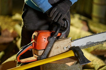 Lumberjack hands and tools