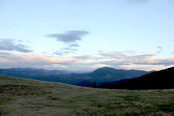 Ukrainian mountains. Spring clouds low mountains
