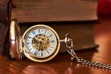 Antique gold-plated pocket watch with chain