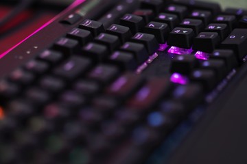 Close up of Computer RGB gaming keyboard, Illuminated by colored LED