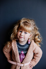 Little fashion girl model posing.