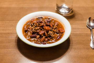 bowl of homemade chili on the table ready for your dining pleasure