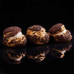 chocolate truffles on a mirror background