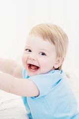 Fototapeta premium happy funny baby on white background