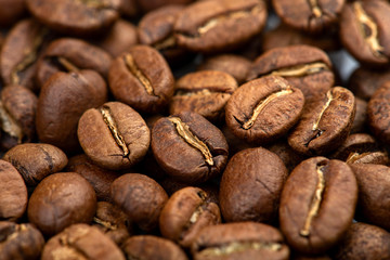 Coffee beans close-up background. Fresh roasted