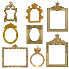 Golden frame with crowns for paintings, mirrors or photos and gothic elements isolated on white...