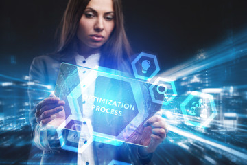 Business, Technology, Internet and network concept. Young businessman working on a virtual screen of the future and sees the inscription: Optimization process