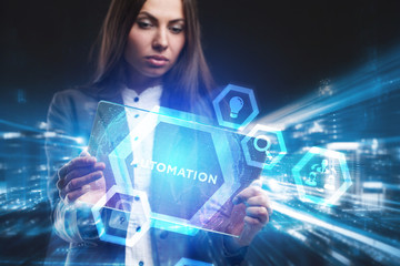 Business, Technology, Internet and network concept. Young businessman working on a virtual screen of the future and sees the inscription: Automation