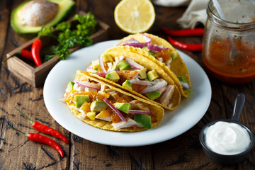 Homemade chicken taco with avocado