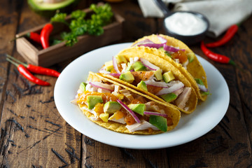 Homemade chicken taco with avocado