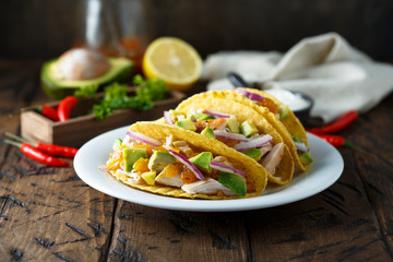 Homemade chicken taco with avocado
