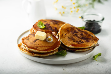 Homemade blueberry pancakes with butter