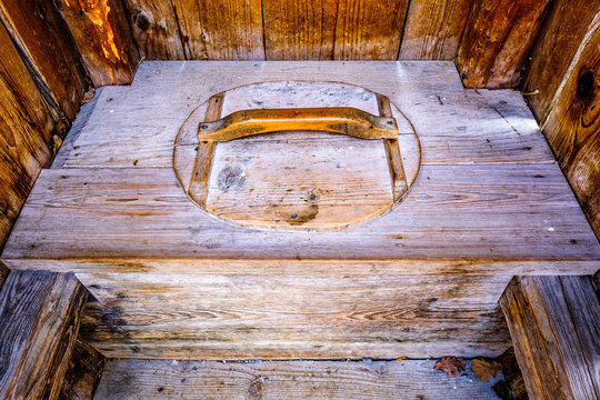 old wooden outhouse