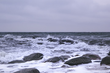 Fototapeta na wymiar Rock's and Stone's in the Surf of the Baltic Sea - Mommark Beach - Denmark - Sydals Kommune 