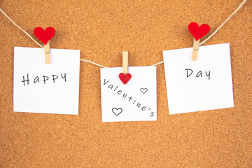 Happy Valentine's Day note on cork board