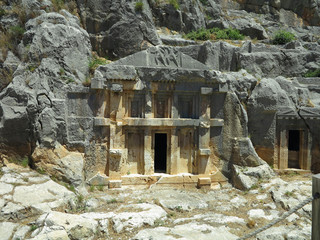 Ancient lycian Myra rock tomb ruins in Demre, Antalya.