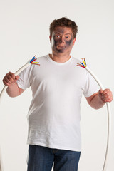 Man holds wires on white background