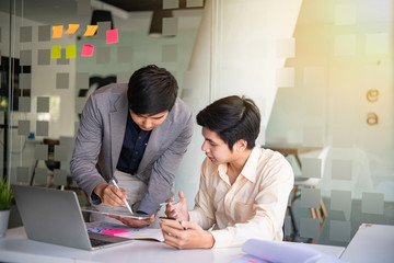 Young business teamwork working with business report document on office desk.Brainstorming Business People Design Planning,Brainstorming Planning Partnership.	