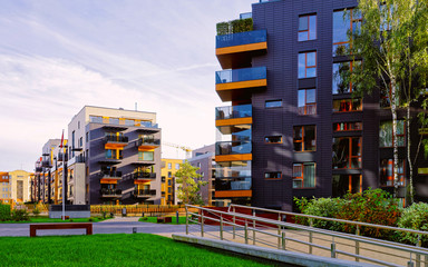 Modern glass apartment residential buildings with reflex