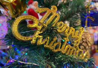 Decorated on the Christmas tree. Christmas signs hanging on the Christmas tree.