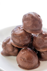 a plate of chocolate balls