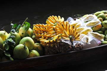 Thai fruit mix in boat. Floating market Thailand, December 2013