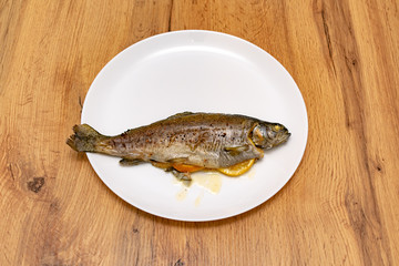 Fried Rainbow trout. Baked trout fish with lemon